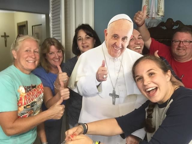 The staff at St. Mary's in Nutley  had some fun posing with the Pope.